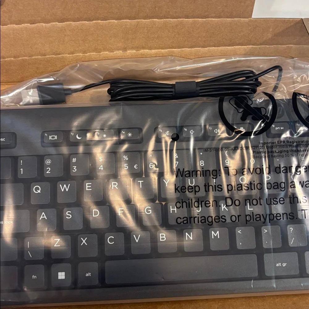 HP 125 Wired Keyboard INTL with HP Mouse